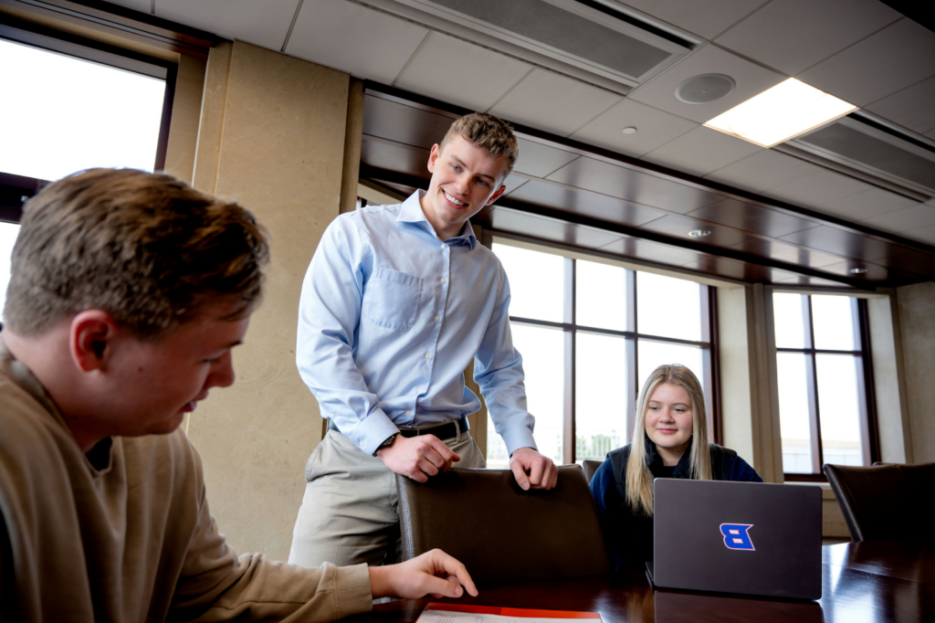 Nick Lloyd in a meeting with fellow students.