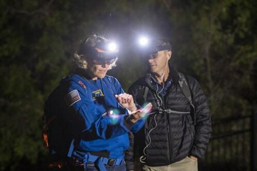 Left, NASA Astronaut and Commander of the Artemis II mission Reid Wiseman and NASA Astronaut Dottie Metcalf-Lindenberger test the information displays.Photo by Priscilla Grover