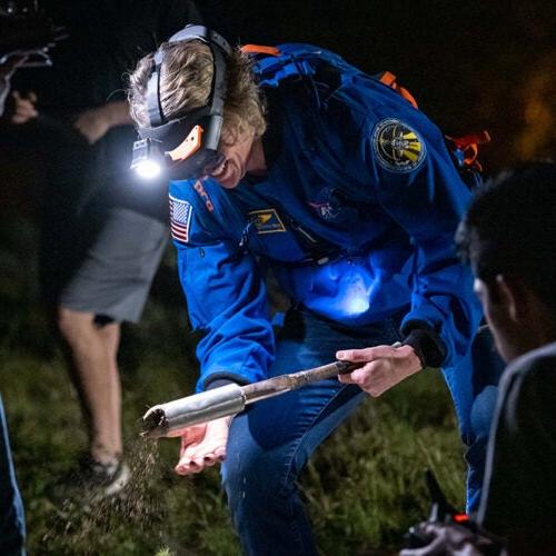 NASA Astronaut Dottie Metcalf-Lindenburger looking for geological features and rocks of interest, complete with soil samples.Photo by Priscilla Grover