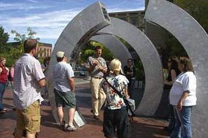 students by sculpture in downtown Boise