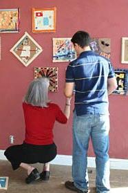 students hanging children's art